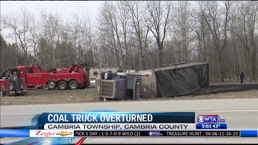 Coal truck overturns_68911680