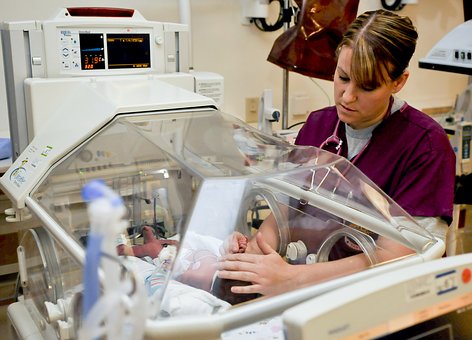 nurse with incubator_1494274921962.jpg