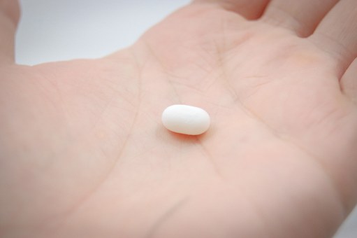 pill in hand_1499801398348.jpg