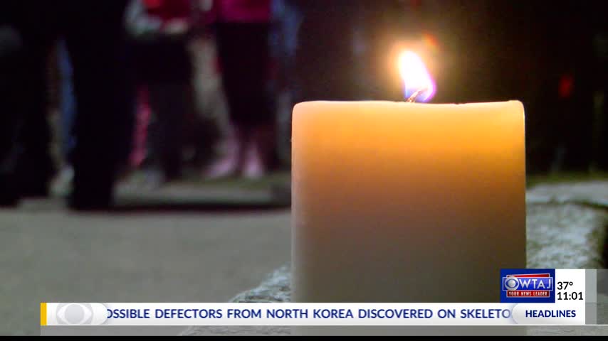 Candlelight Vigil held for double murder victims_44232325