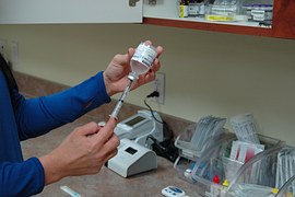 nurse with syringe_1529360924784.jpg.jpg